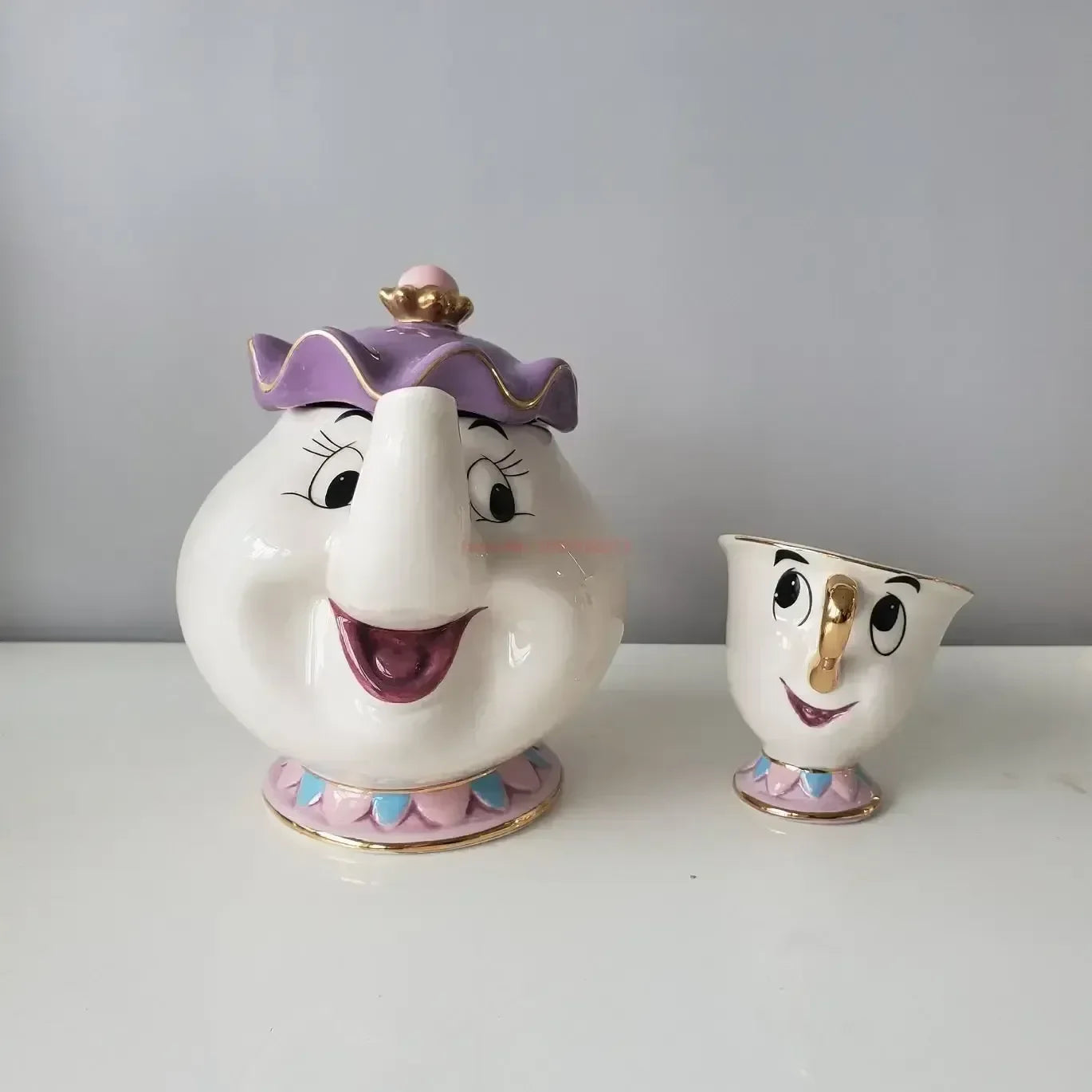 Tetera de Disney Linda caricatura de La Bella y la Bestia Cafeteras Taza Taza de la Sra. Potts Chip Taza de Té Teteras Un Juego de Té